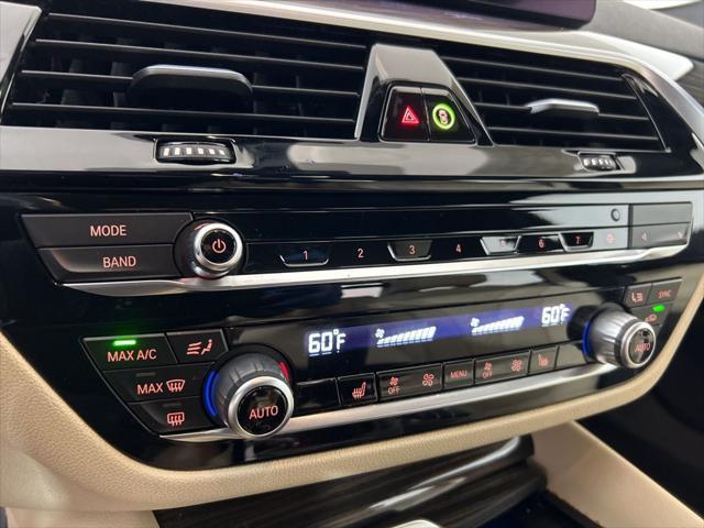 used 2023 BMW 530e car, priced at $39,562
