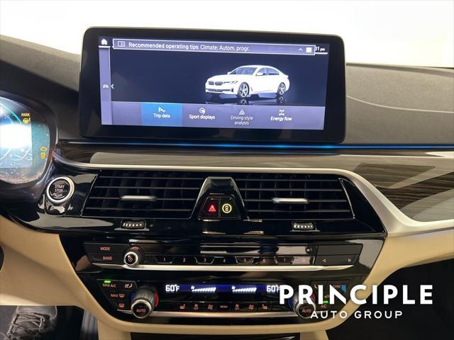 used 2023 BMW 530e car, priced at $38,962