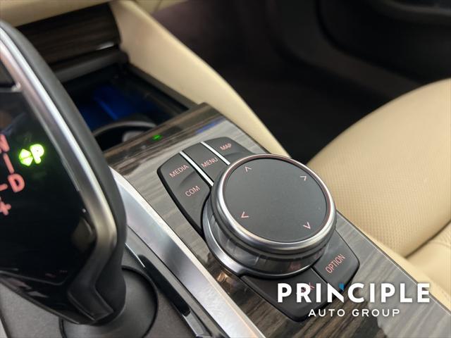 used 2023 BMW 530e car, priced at $38,962