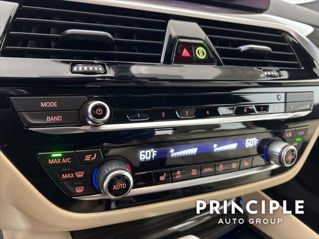 used 2023 BMW 530e car, priced at $38,962