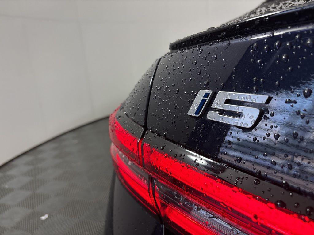 used 2024 BMW i5 car, priced at $65,962