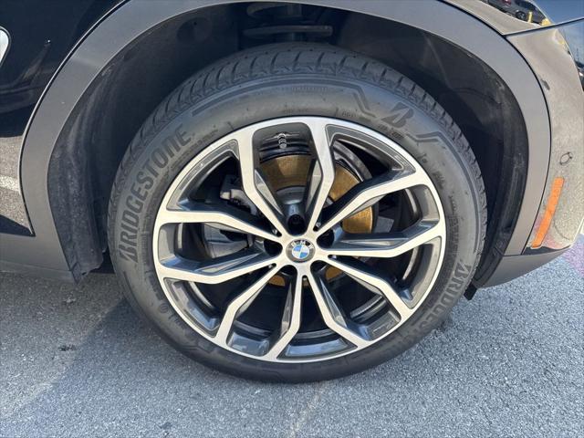 used 2025 BMW X4 car, priced at $57,962