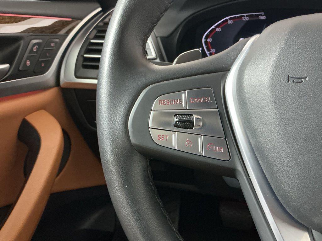 used 2023 BMW X4 car, priced at $45,262