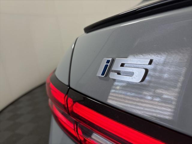 new 2025 BMW i5 car, priced at $73,675