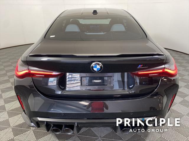 used 2024 BMW M4 car, priced at $84,262