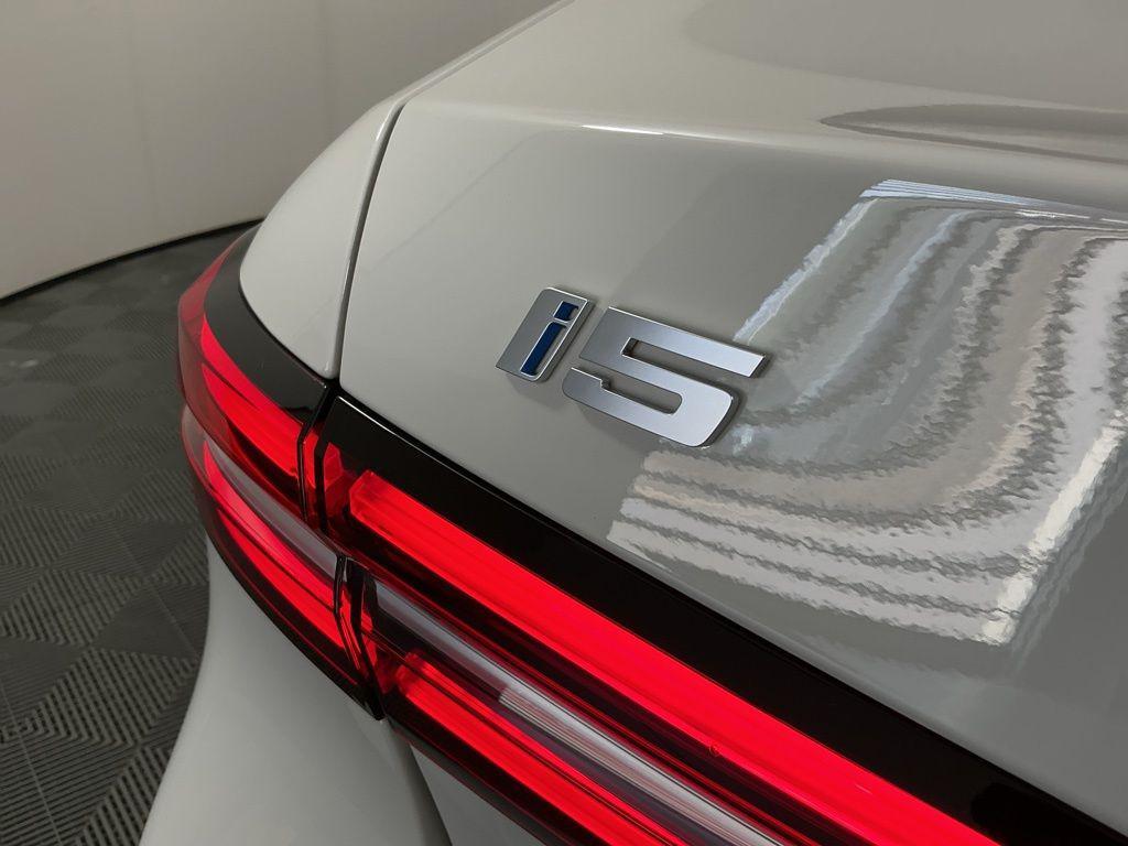 used 2024 BMW i5 car, priced at $46,962