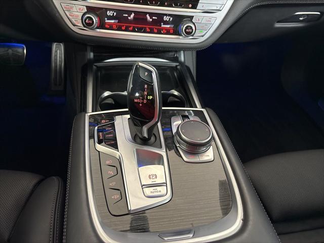 used 2022 BMW 745e car, priced at $50,962