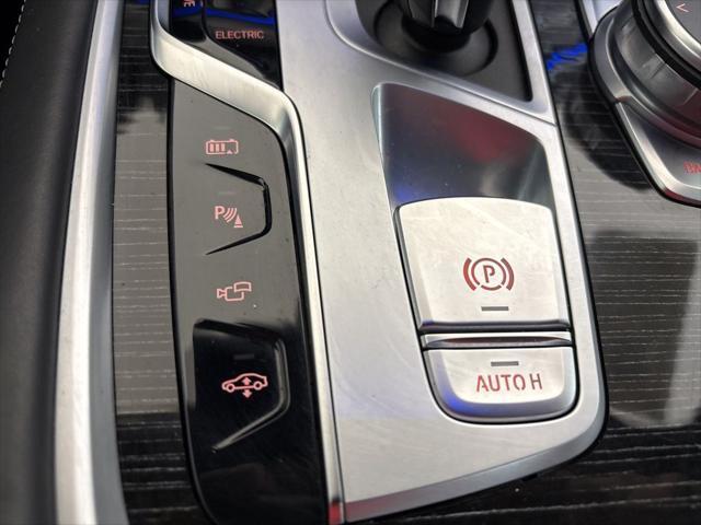 used 2022 BMW 745e car, priced at $50,962