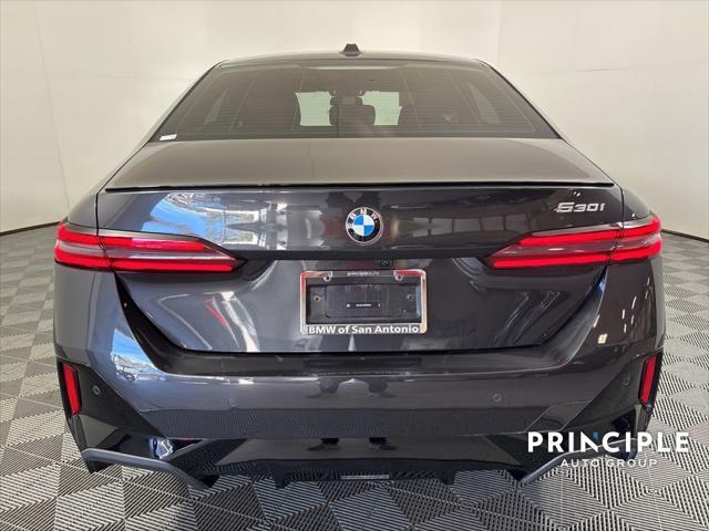 used 2024 BMW 530 car, priced at $61,245