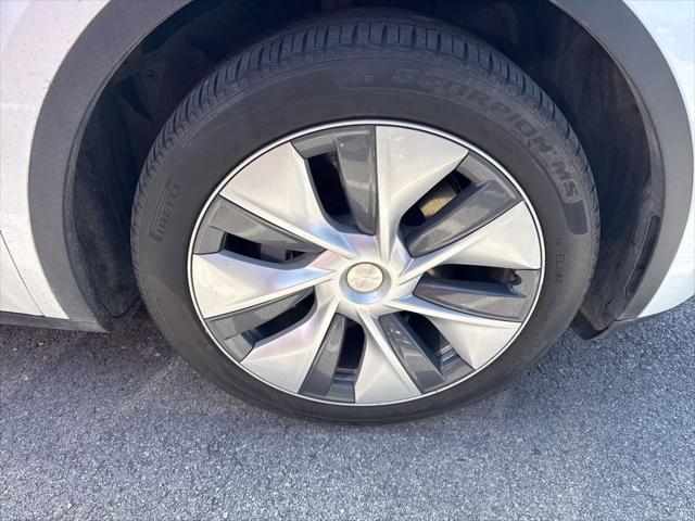 used 2023 Tesla Model Y car, priced at $28,562