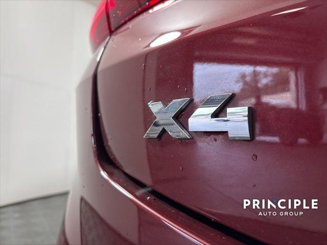 used 2023 BMW X4 car, priced at $59,962