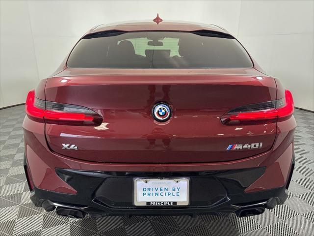 used 2023 BMW X4 car, priced at $58,962