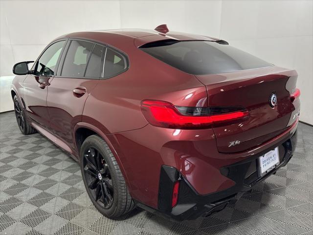 used 2023 BMW X4 car, priced at $58,962