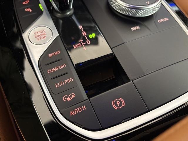 used 2023 BMW X4 car, priced at $58,962