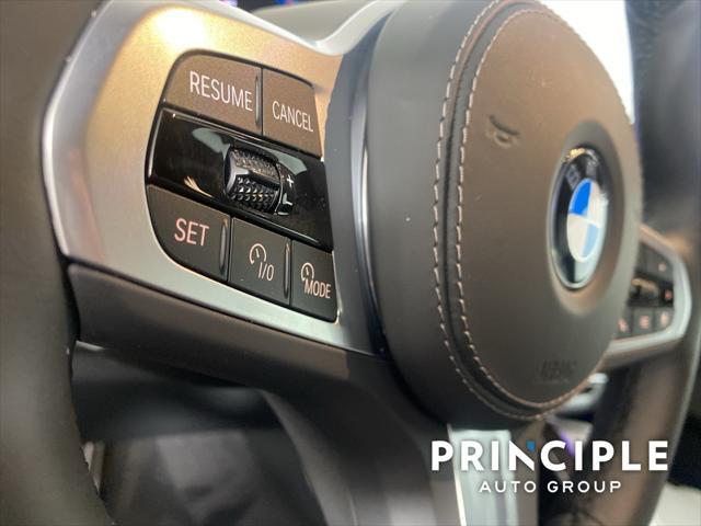 used 2024 BMW X6 car, priced at $77,162