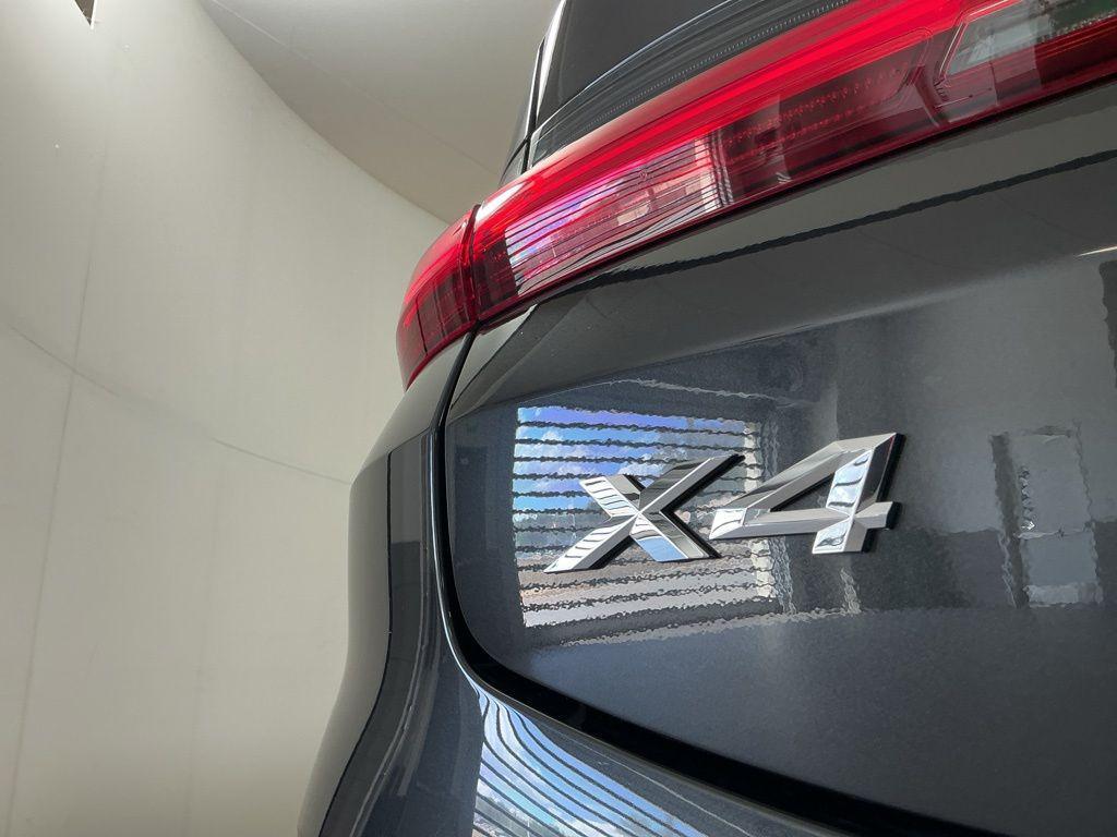 used 2023 BMW X4 car, priced at $44,262
