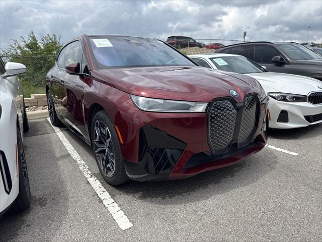 new 2024 BMW iX car, priced at $97,795