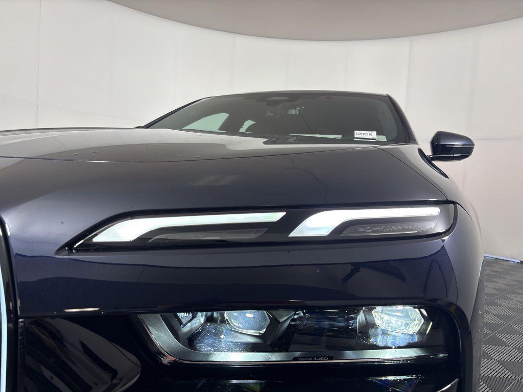 new 2025 BMW 740 car, priced at $104,475