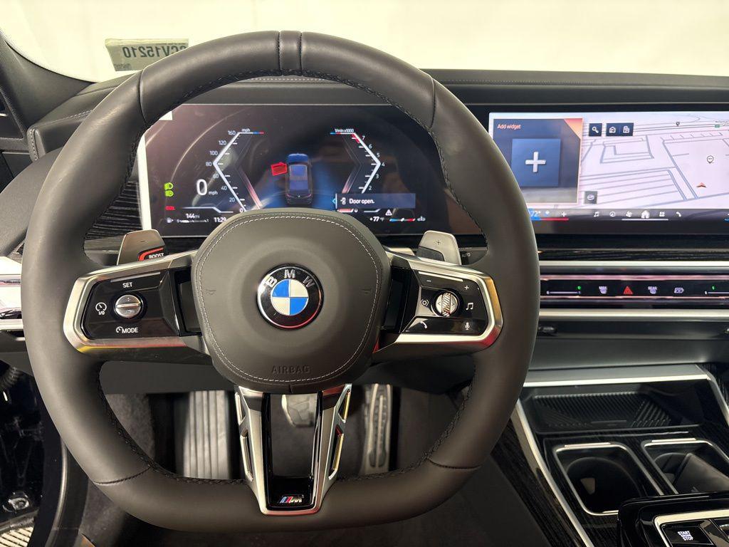 new 2025 BMW 740 car, priced at $104,475