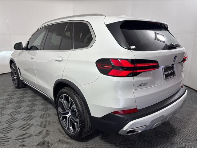 used 2025 BMW X5 car, priced at $68,962