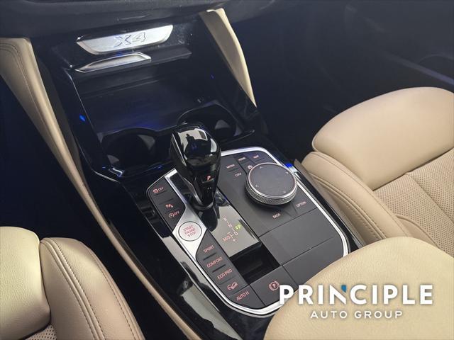 used 2023 BMW X4 car, priced at $39,962
