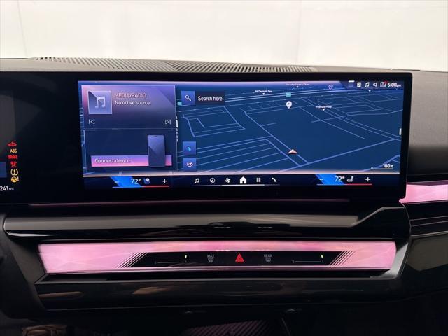 used 2024 BMW i5 car, priced at $56,962