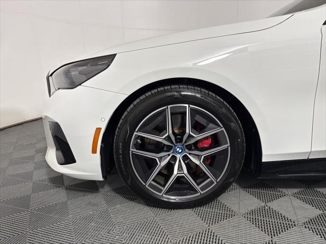 used 2024 BMW i5 car, priced at $56,962
