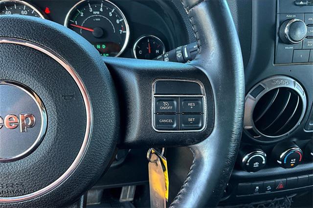 used 2015 Jeep Wrangler Unlimited car, priced at $18,373