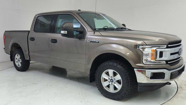 used 2018 Ford F-150 car, priced at $27,816