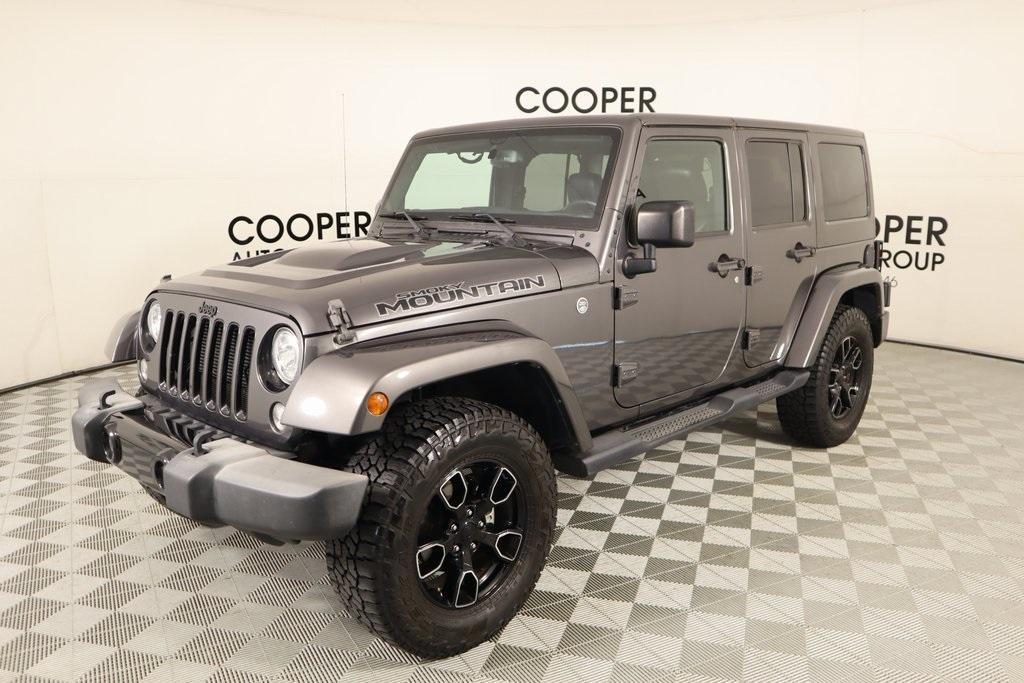 used 2017 Jeep Wrangler Unlimited car, priced at $23,054