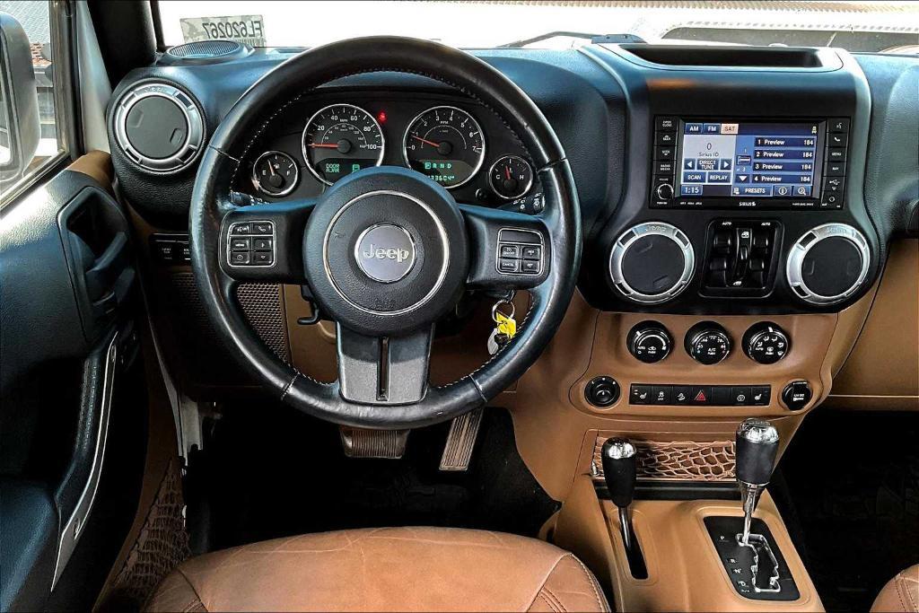 used 2015 Jeep Wrangler Unlimited car, priced at $19,922