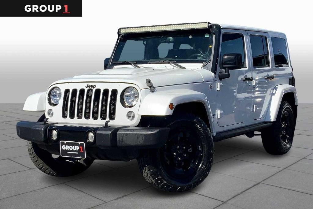 used 2015 Jeep Wrangler Unlimited car, priced at $18,495