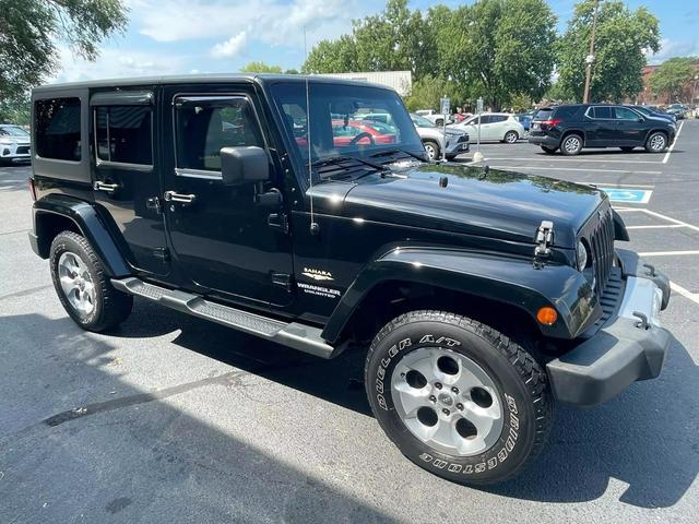 used 2014 Jeep Wrangler Unlimited car, priced at $20,583