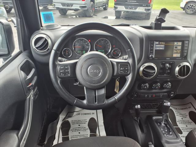 used 2016 Jeep Wrangler Unlimited car, priced at $19,540