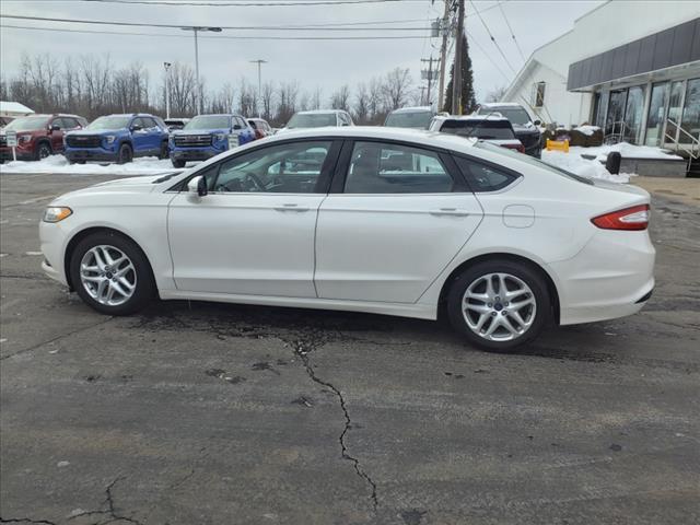 used 2016 Ford Fusion car, priced at $10,850