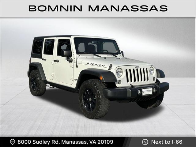 used 2014 Jeep Wrangler Unlimited car, priced at $18,490