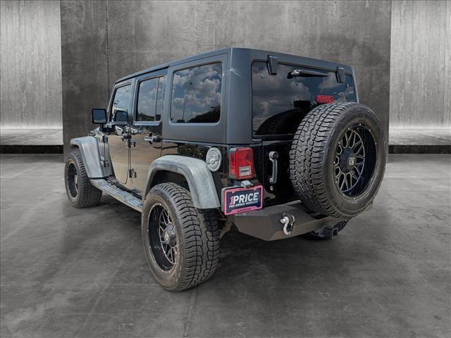 used 2016 Jeep Wrangler Unlimited car, priced at $19,393