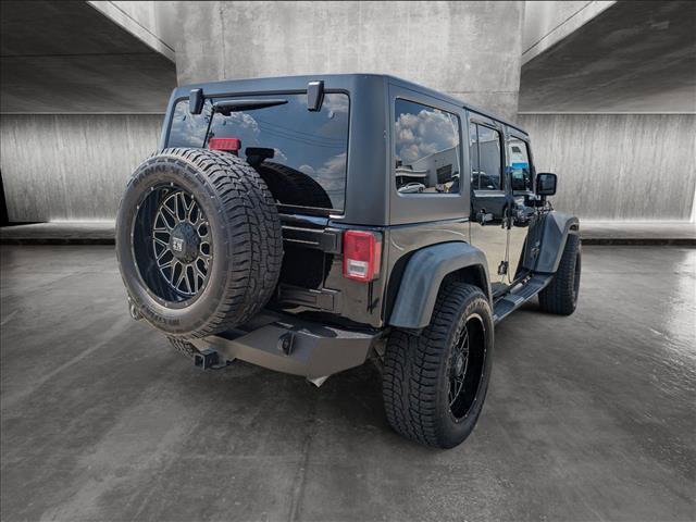 used 2016 Jeep Wrangler Unlimited car, priced at $19,393