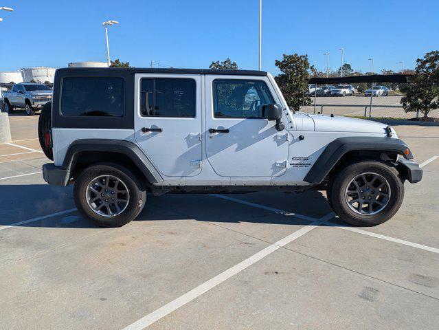 used 2015 Jeep Wrangler Unlimited car, priced at $20,593