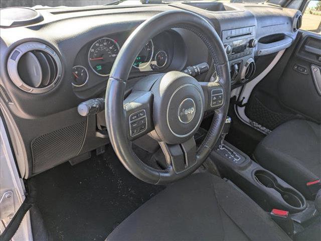 used 2015 Jeep Wrangler Unlimited car, priced at $19,399