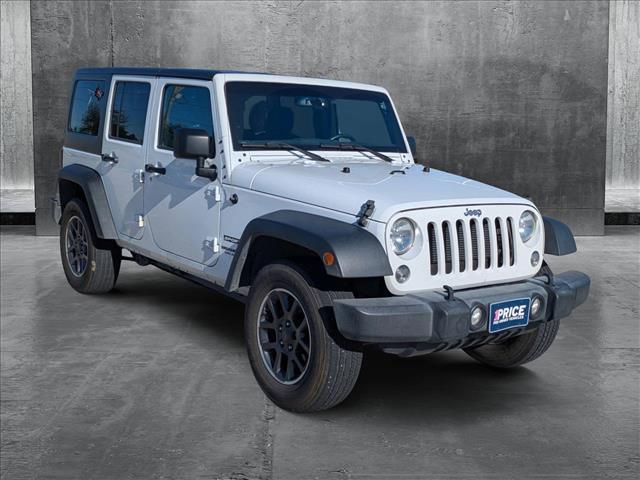 used 2015 Jeep Wrangler Unlimited car, priced at $19,399