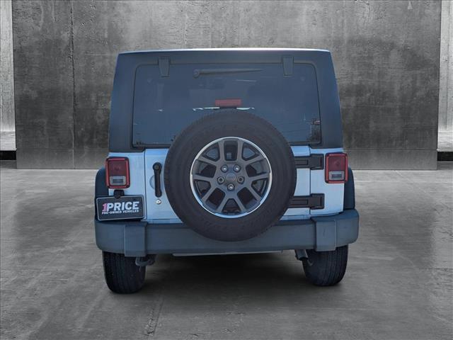 used 2015 Jeep Wrangler Unlimited car, priced at $19,399