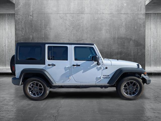 used 2015 Jeep Wrangler Unlimited car, priced at $19,399