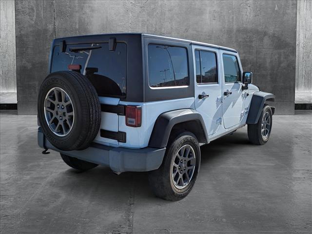 used 2015 Jeep Wrangler Unlimited car, priced at $19,399