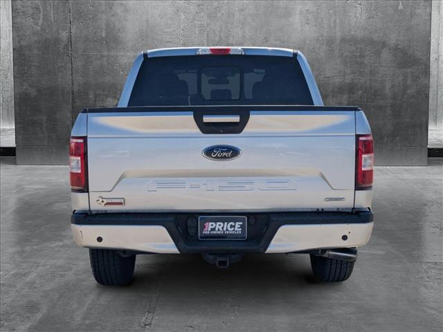used 2018 Ford F-150 car, priced at $23,347