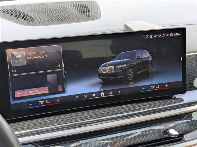 used 2024 BMW X5 car, priced at $59,273
