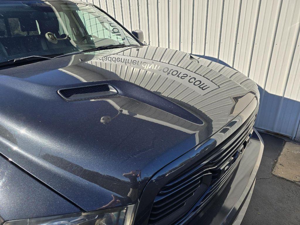 used 2018 Ram 1500 car, priced at $29,991