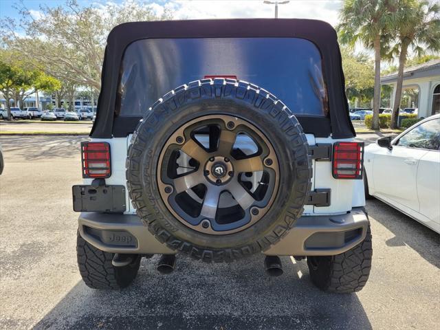 used 2016 Jeep Wrangler Unlimited car, priced at $16,590