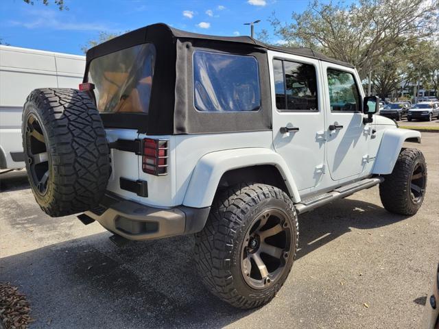 used 2016 Jeep Wrangler Unlimited car, priced at $16,590