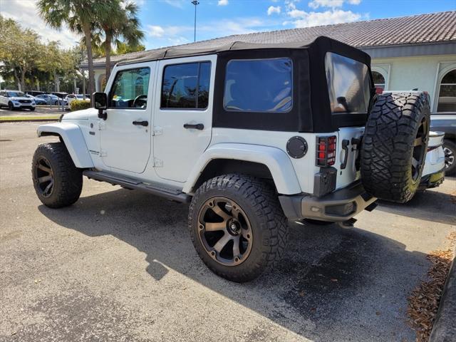 used 2016 Jeep Wrangler Unlimited car, priced at $16,590